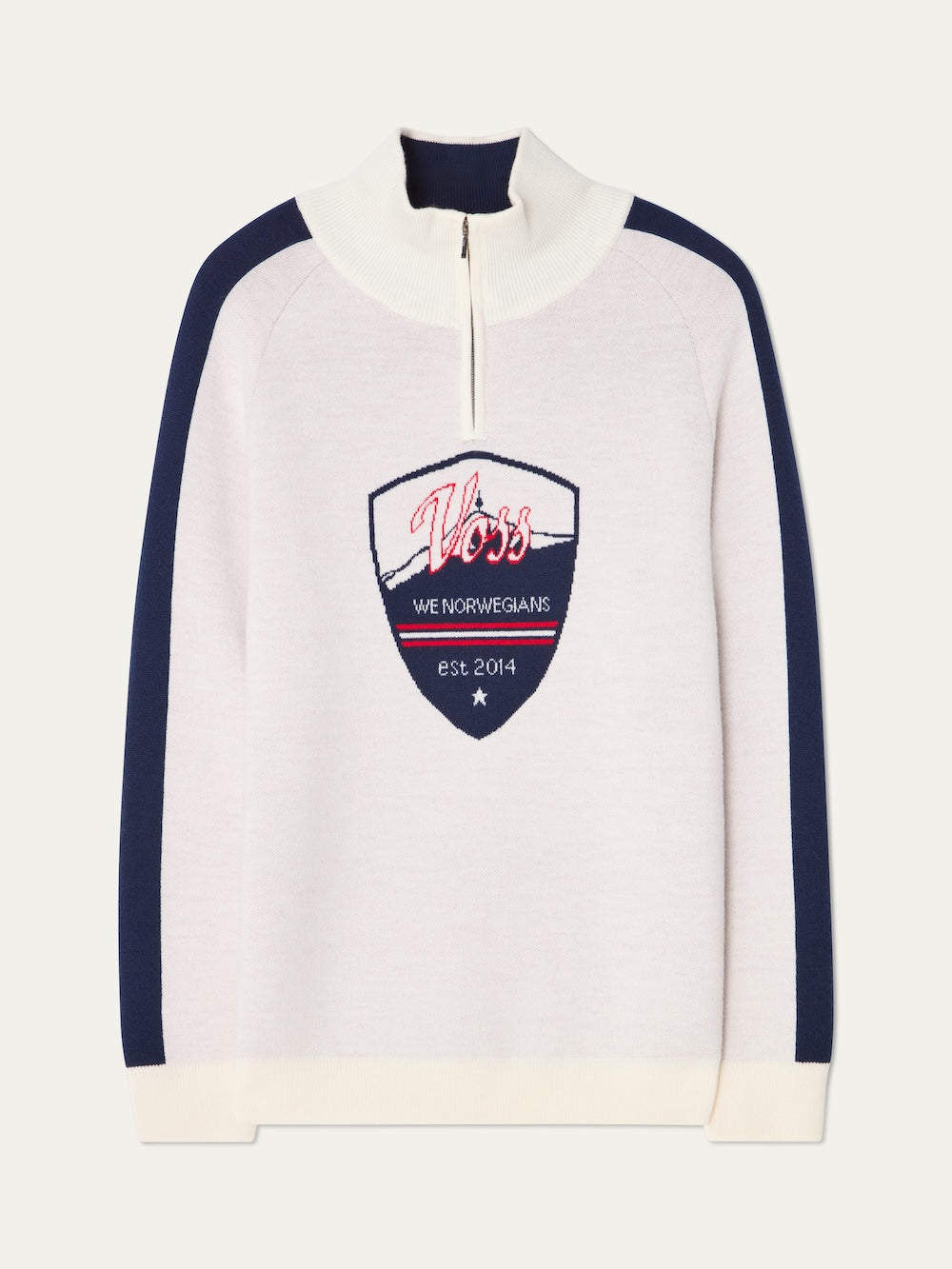 The Afterski Sweater Men by We Norwegians features a white merino wool body, navy sleeves, half-zip collar, and a retro shield patch with "Voss"—the perfect ski sweater for your next AfterSki adventure.