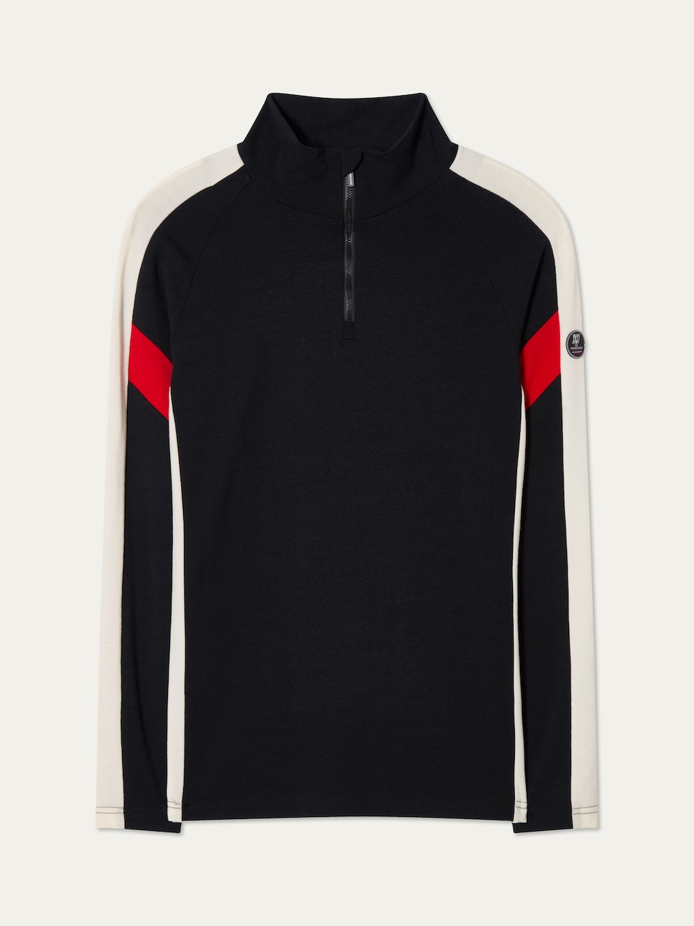 The We Norwegians Zermatt Zipup Men is a Merino wool ski sweater with a half-zip collar, black body, cream sleeves with black inner arms, diagonal red stripes, and a circular patch on the left sleeve.