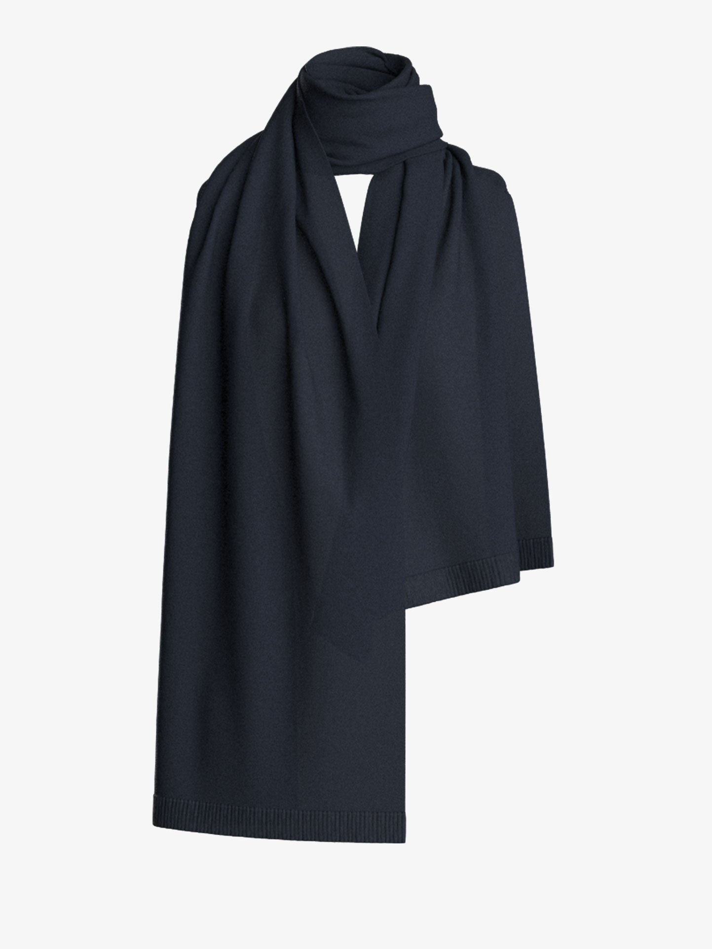 A Blefjell Cashmere Scarf by We Norwegians, in a folded dark gray design and featuring a soft, smooth texture, is elegantly draped against a plain, light-colored background.