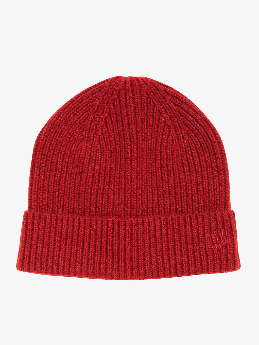 The Blefjell Hat by We Norwegians is a red knitted beanie with a ribbed texture and an adjustable cuff, adorned with a subtle tonal embroidery on the front.