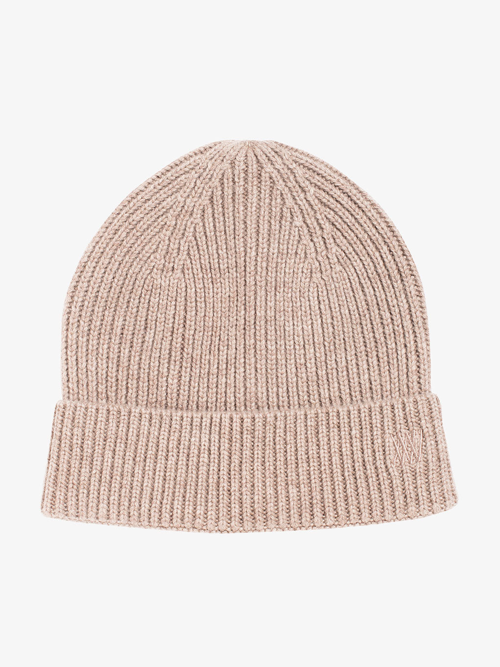 The Blefjell Hat by We Norwegians features a beige knitted design with a folded brim and tonal embroidery logo on the side. This cashmere hat showcases a ribbed texture and is set against a plain white background.