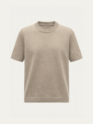 The Club Top Women - Summer Cashmere by We Norwegians, a beige short-sleeve crewneck t-shirt made from lightweight cashmere, is displayed against a light, neutral background.