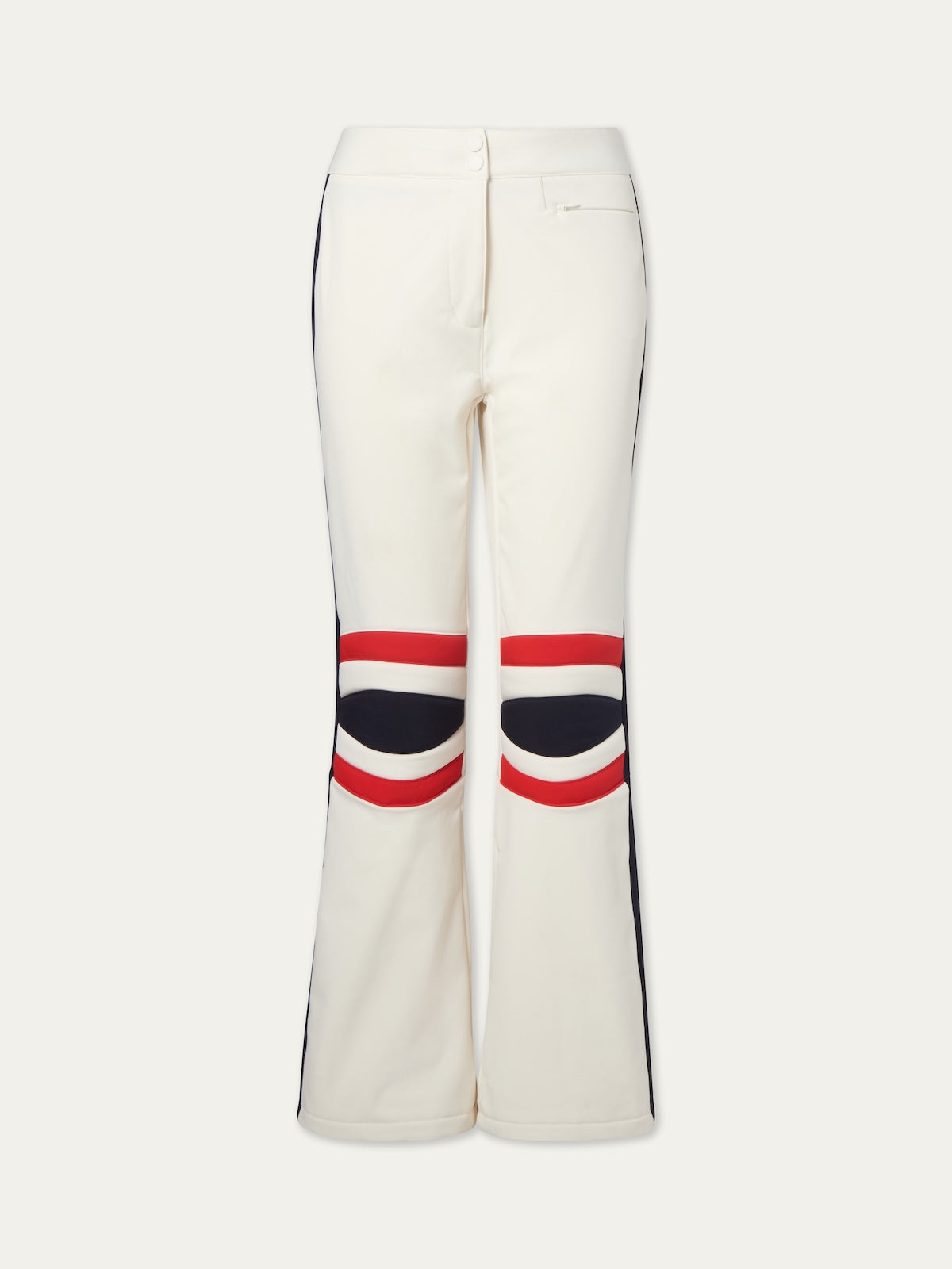 The We Norwegians Solo Ski Pant women features black and red curved stripes above the knees, padded knees for comfort, a front button and zip closure, and a small front right pocket.