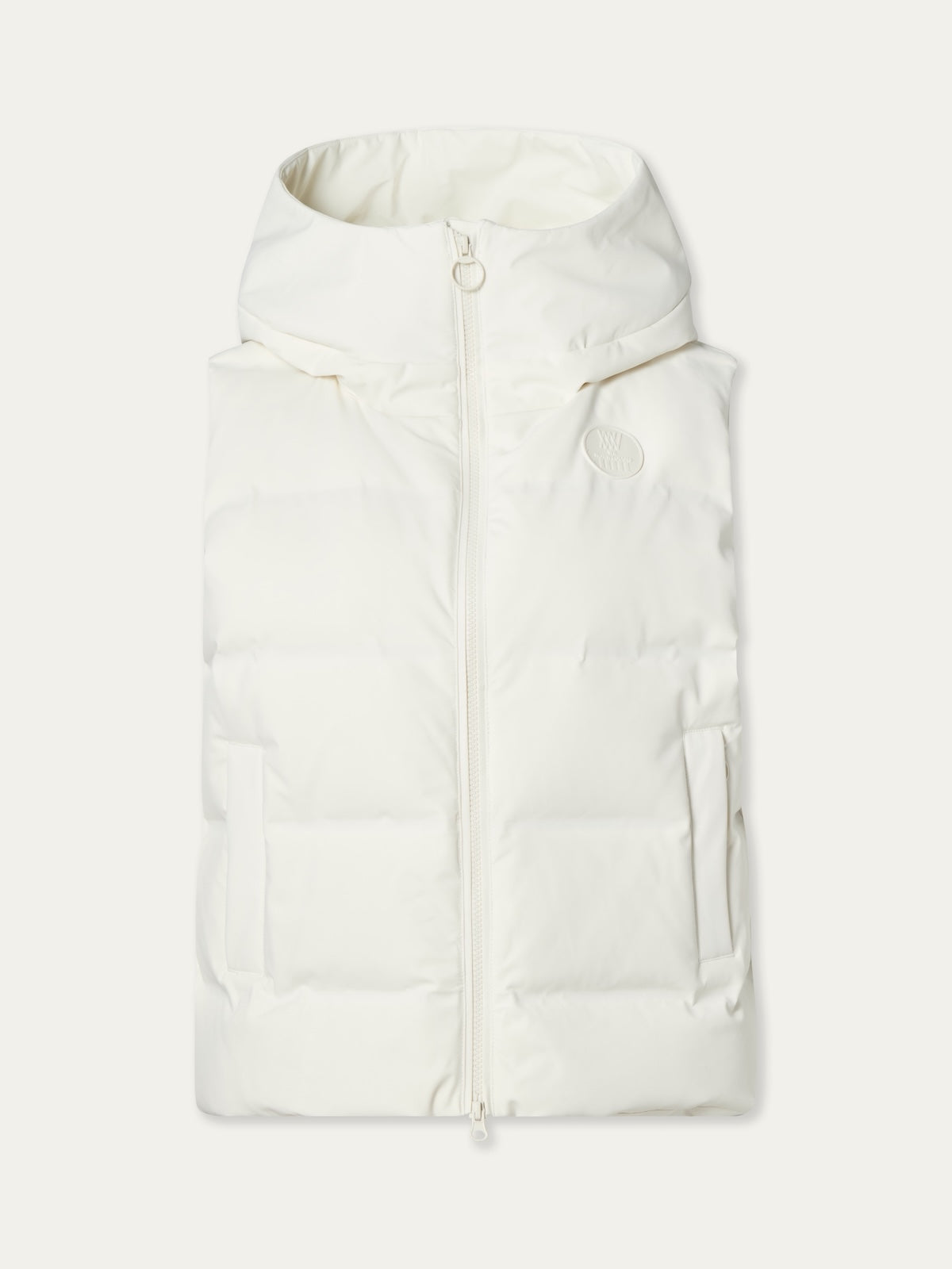 The We Norwegians Aurora Vest women is a white puffer vest with a front zipper, two side pockets, and a subtle circular chest logo, reflecting Scandinavian style and crafted as a responsible down vest. Shown laid flat on a plain background.