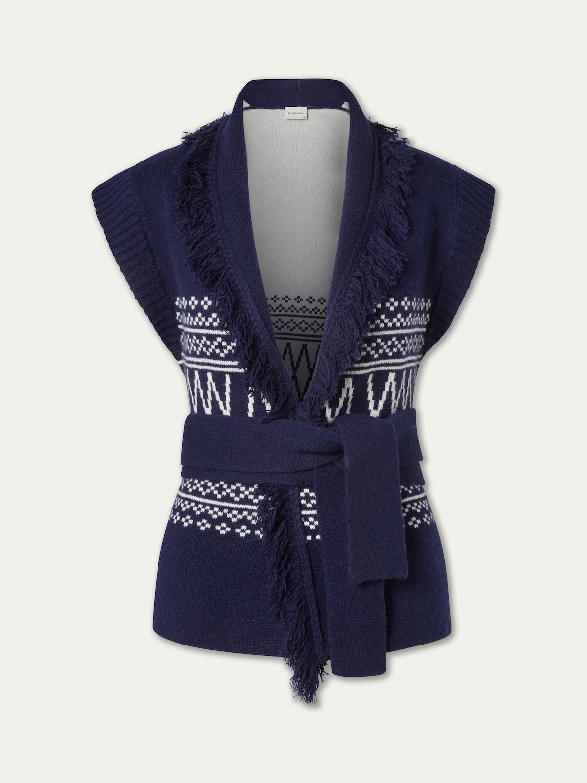 The Setesdal Vest women by We Norwegians is a navy sleeveless knit cardigan featuring a shawl collar, fringe trim, white geometric Norwegian-inspired patterns, and a matching waist belt.