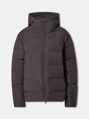 The We Norwegians Nordlys Ski Jacket men is a dark gray, puffy hooded jacket with a waterproof finish, front zipper, and two side pockets, shown against a plain light background.