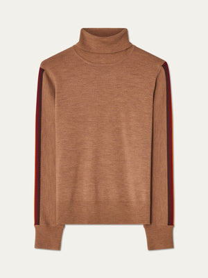The FreeBird Turtleneck Women by We Norwegians is a brown merino wool sweater with red and dark brown sleeve stripes, shown on a plain background. Ideal for stylish ski outfits or cozy winter wear.