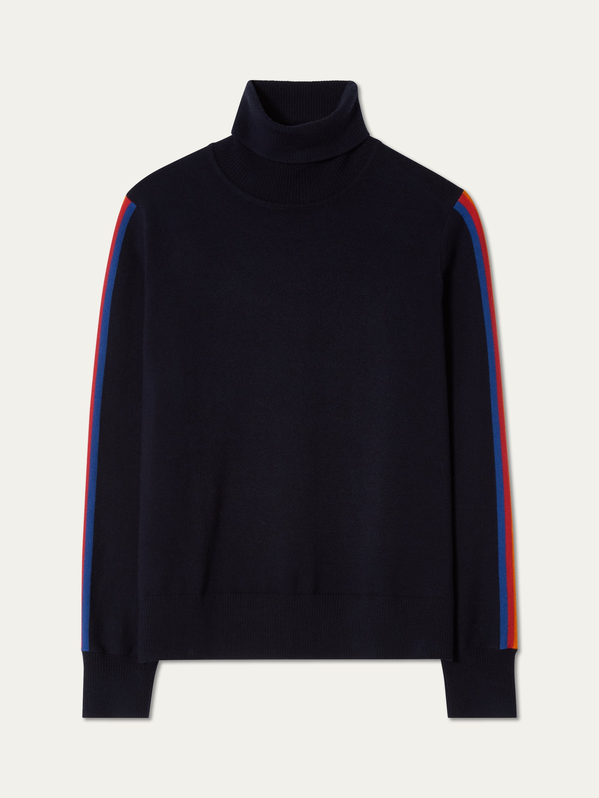 The We Norwegians FreeBird Turtleneck Women’s sweater is black merino wool with blue and red stripes on each sleeve, shown against a plain white background.