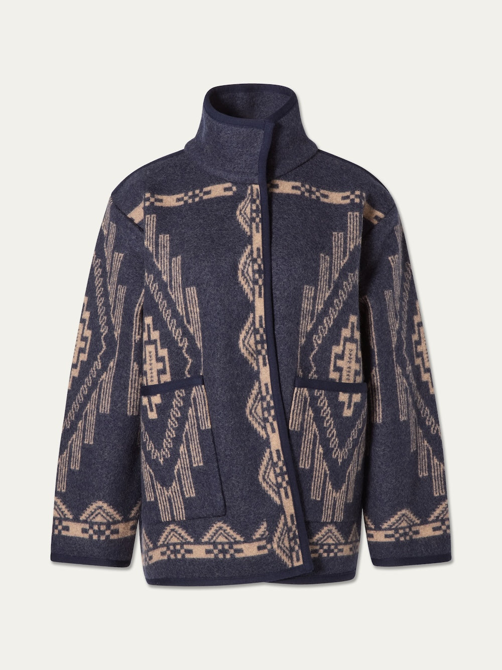 We Norwegians Pioneer Jacket women in dark navy boiled wool with a zip-up front, high collar, and an ivory geometric pattern.