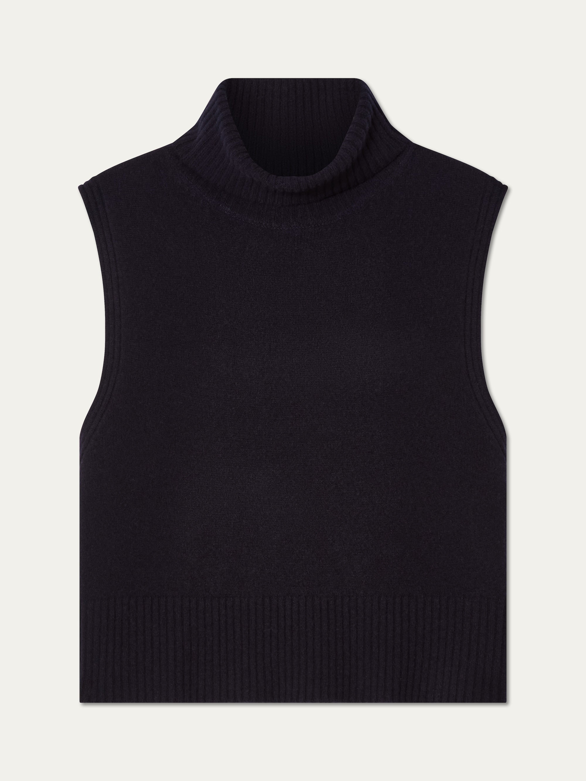 The Geilo Vest women by We Norwegians is a sleeveless black knit turtleneck sweater vest in extrafine Merino wool, featuring ribbed details at the neck, armholes, and hem, shown against a plain light background.