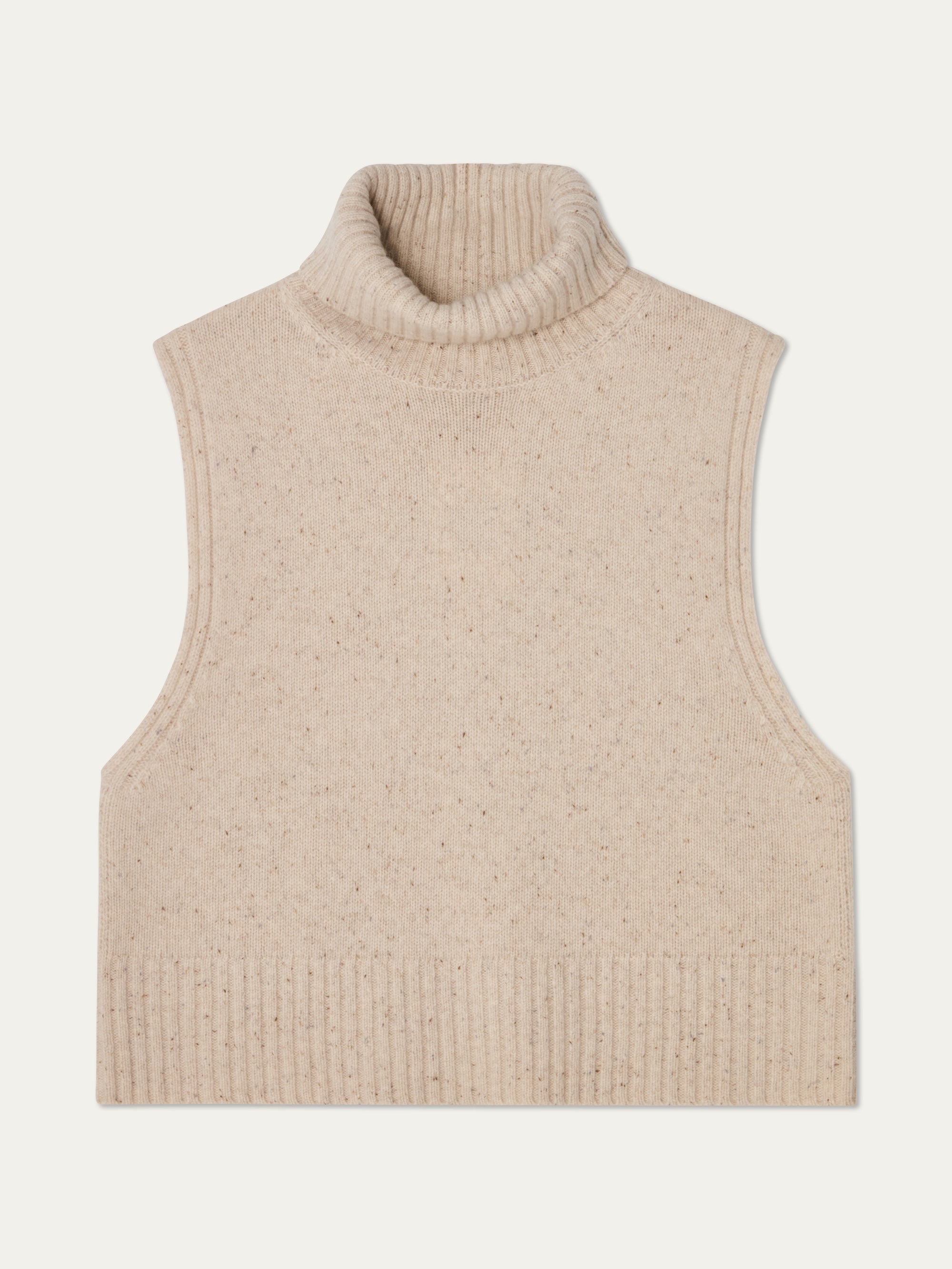 The We Norwegians Highland Vest for women is a beige, sleeveless merino wool vest with a knitted turtleneck and ribbed detailing at the neck, armholes, and hem, shown laid flat on a white background.