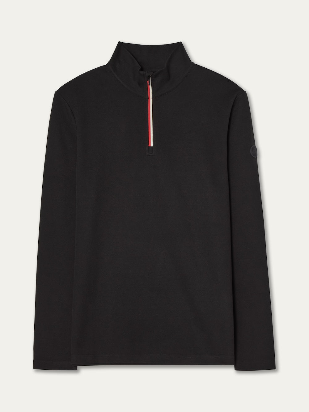 The We Norwegians Moore ZipUp Solid men is a black long-sleeve base layer with a high collar and half-zip front featuring red and white accents. Its minimalist design makes it ideal for an alpine-inspired style.