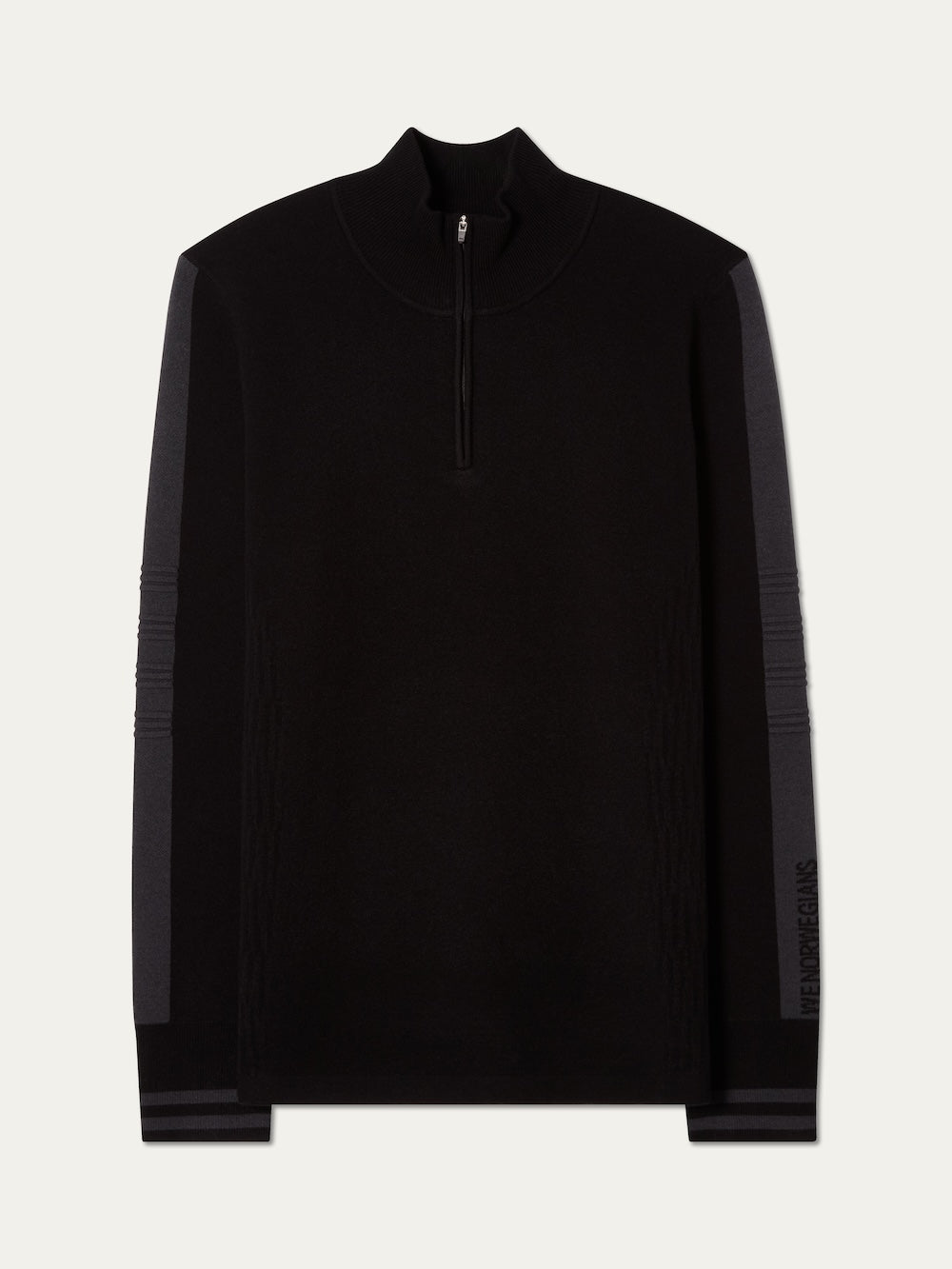The We Norwegians Rocky ZipUp men is a vintage alpine-style black pullover with a half-zip collar, dark gray sleeve panels, subtle textured details, and small brand lettering near the left wrist.