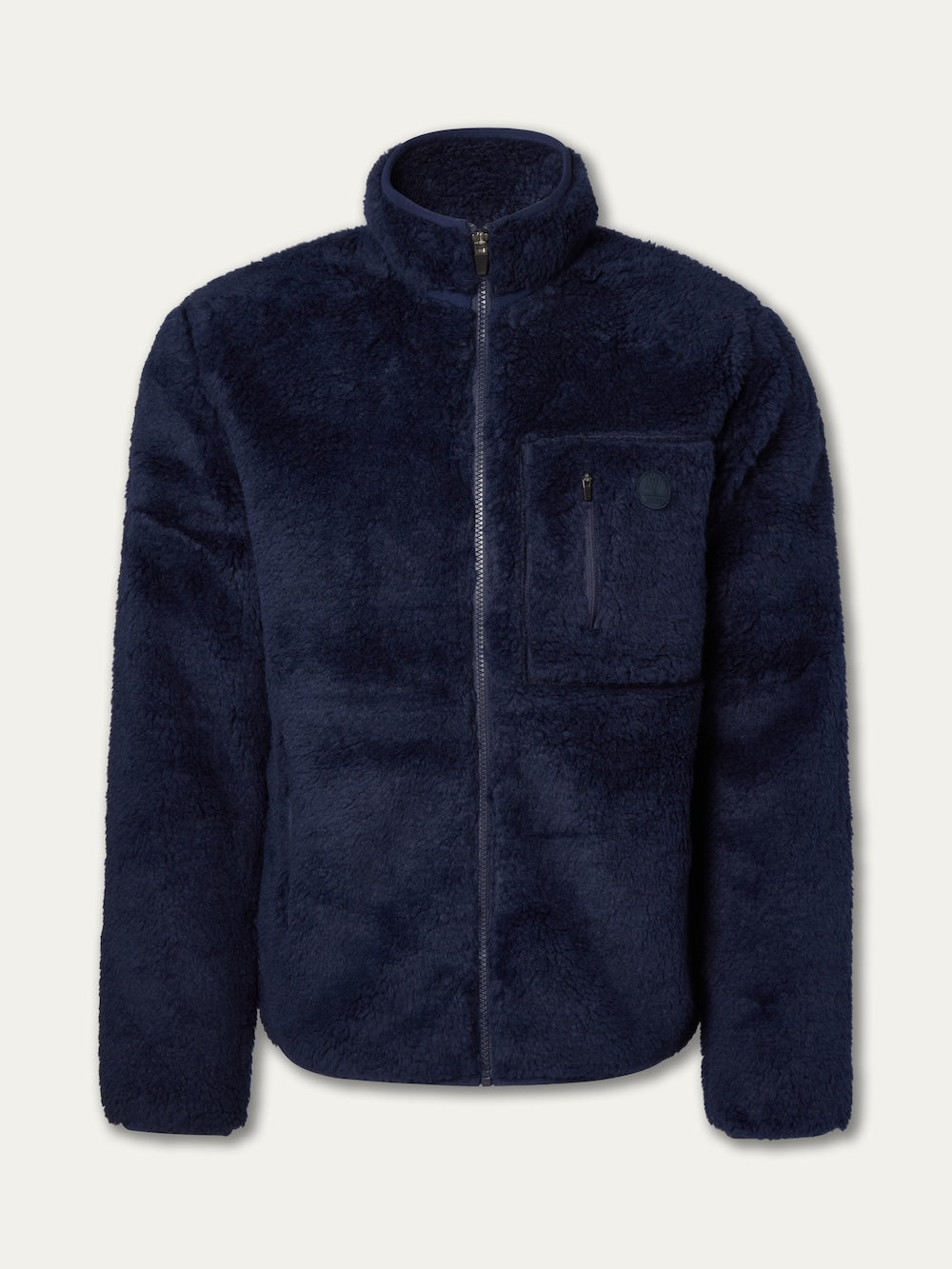 The We Norwegians Kebnekaise Jacket men is a navy blue zip-up fleece ski mid-layer with a high collar and a zippered left chest pocket, shown against a plain light background.