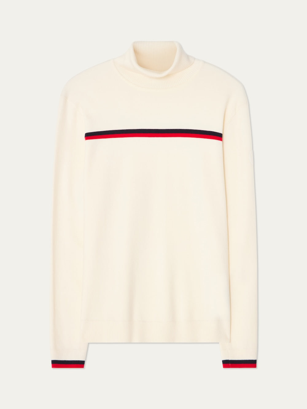 The We Norwegians FreeBird TurtleNeck men’s sweater, in cream merino wool with red and black stripes on the chest and cuffs, is a cozy winter layer shown laid flat on a light background.