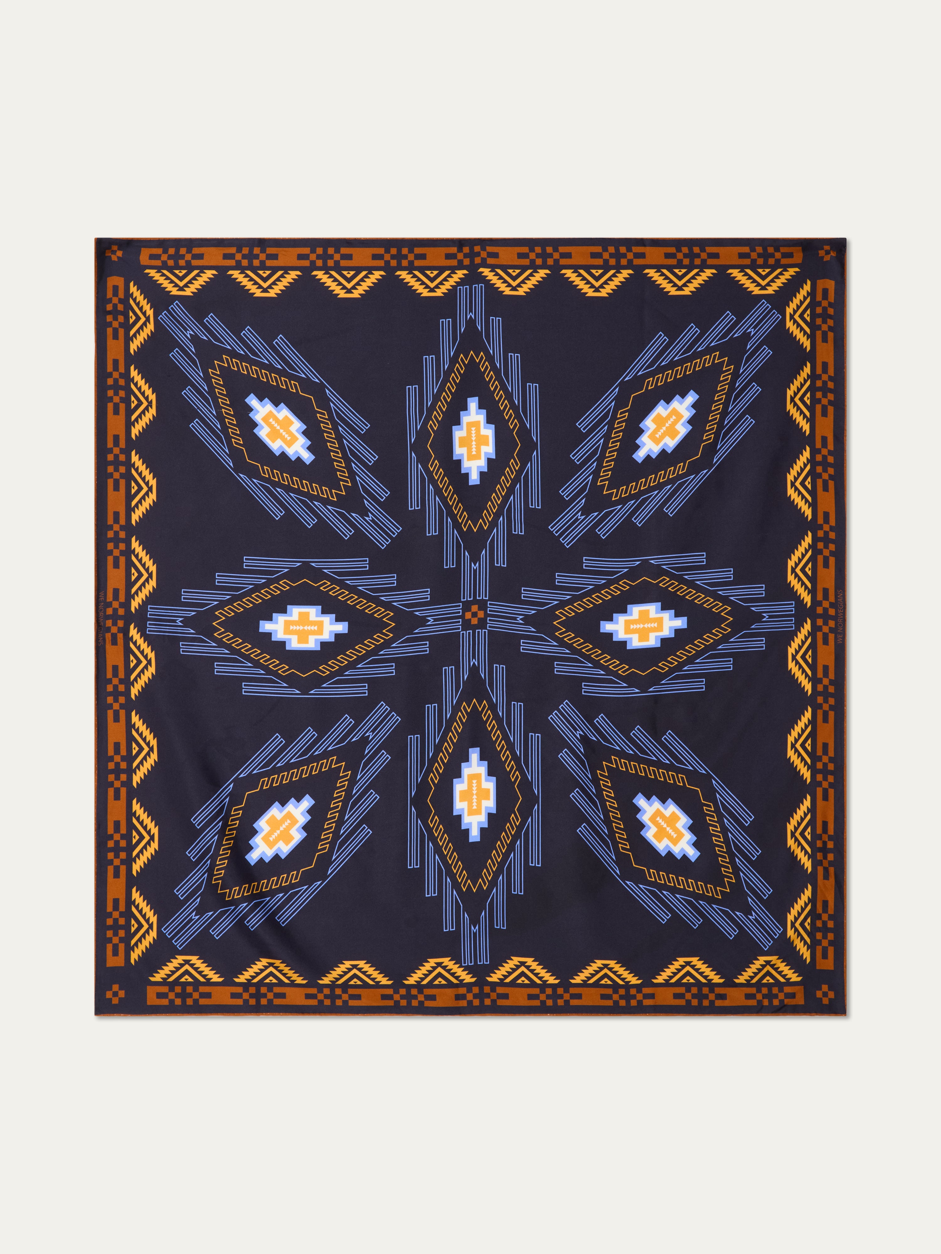 We Norwegians | FW25 | Pioneer Silk scarf_Navy Blue | A pure silk scarf printed with motifs inspired by Indigenous Native American art against an off-white background