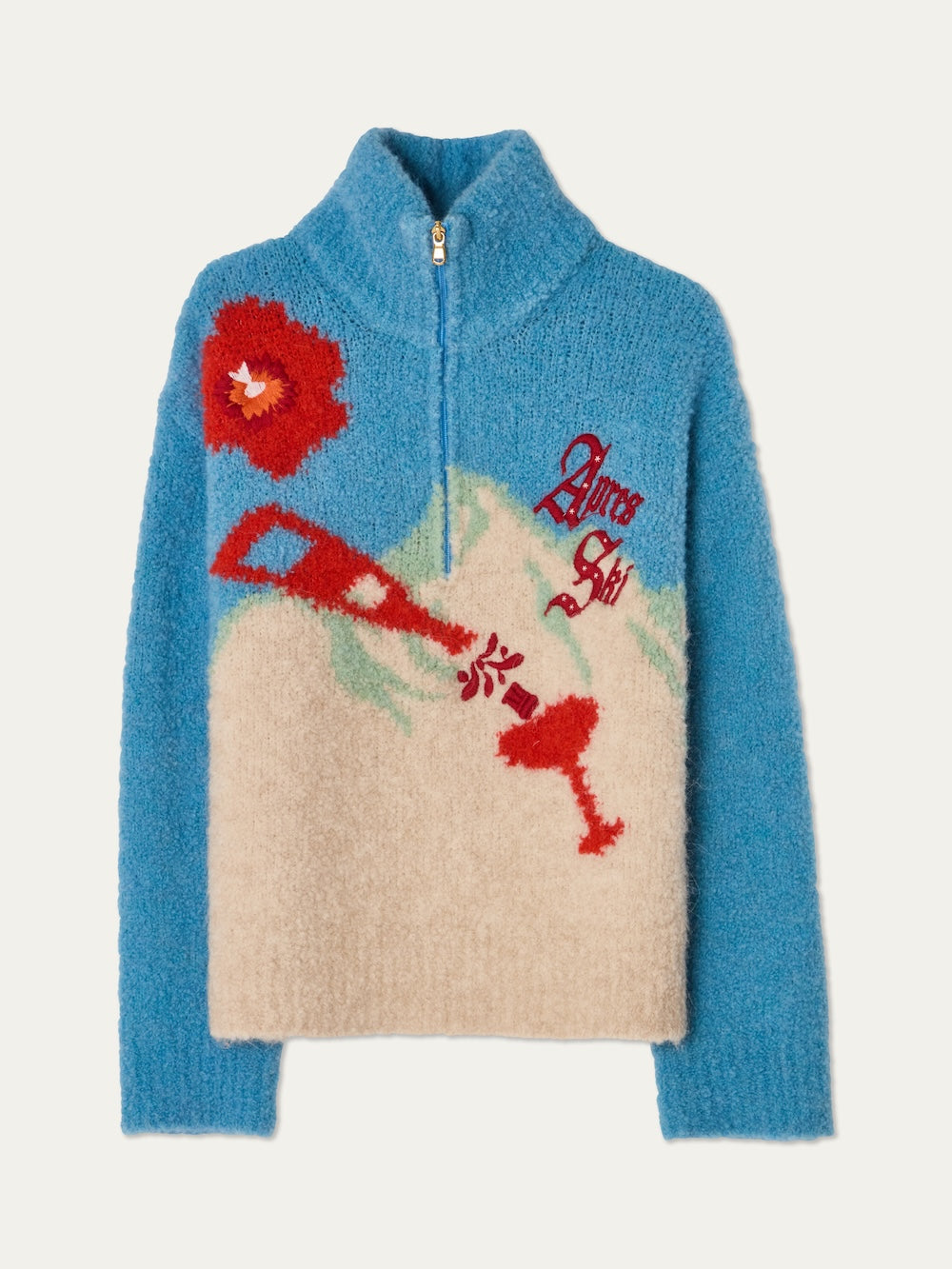 The We Norwegians WN x Markarian Bouclé Sweater for women is a limited edition, fuzzy blue and cream half-zip with Italian bouclé yarn, showcasing a red ski lift, red flower, green mountains, and “Après Ski” on the front.