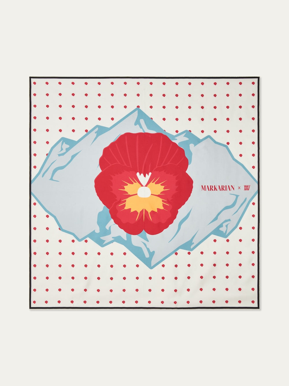 The WN x Markarian Silk Scarf for women by We Norwegians features a bold red flower with a yellow center atop blue geometric shapes, set on a white background with red polka dots and "MARKARIAN X" printed on the right side.