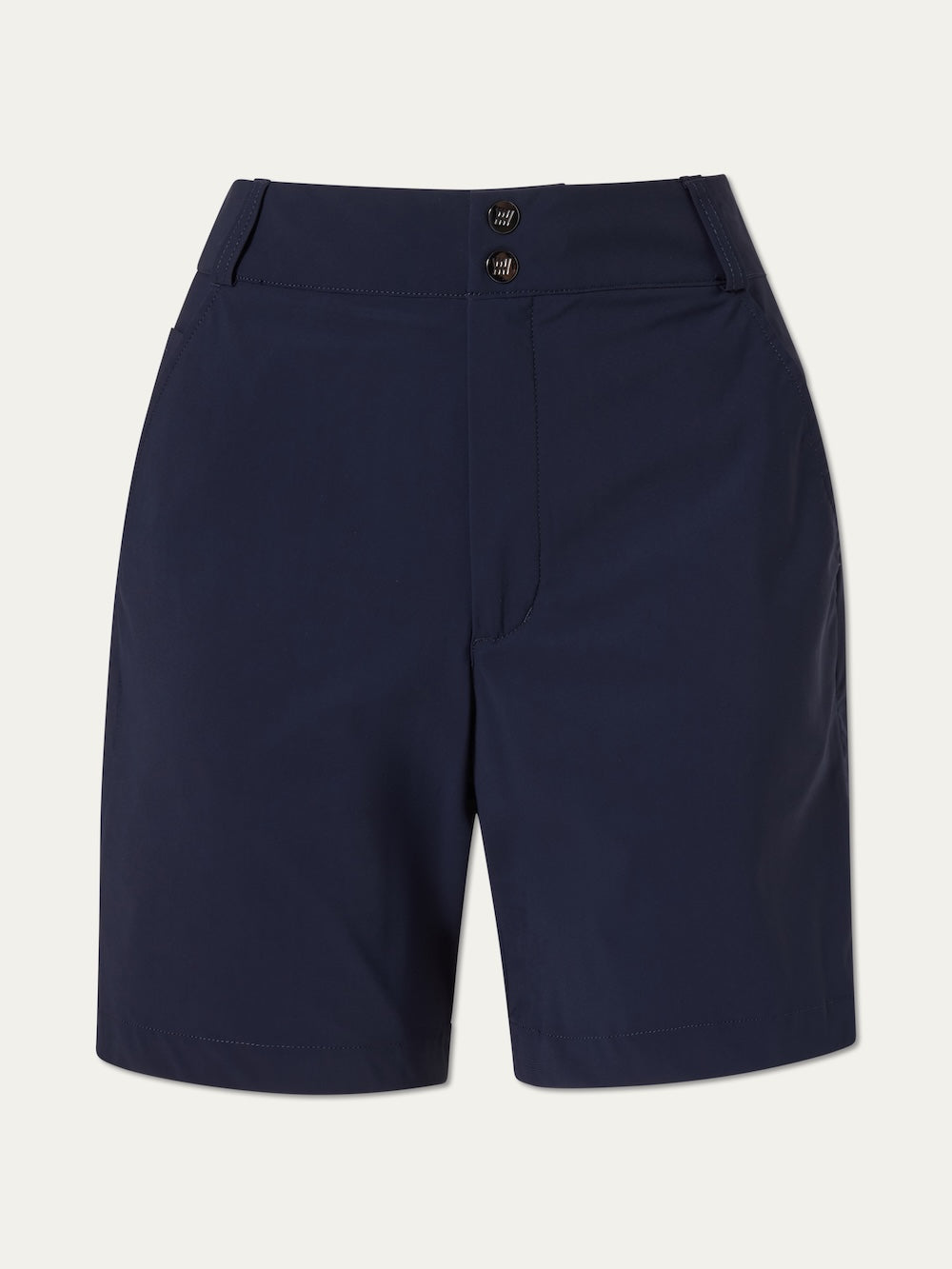 The We Norwegians Albatross Shorts Women are navy blue, knee-length golf shorts with a flat front, two side pockets, and a double-button waistband. Made from 4-way stretch, water-repellent fabric and shown against a plain light background.