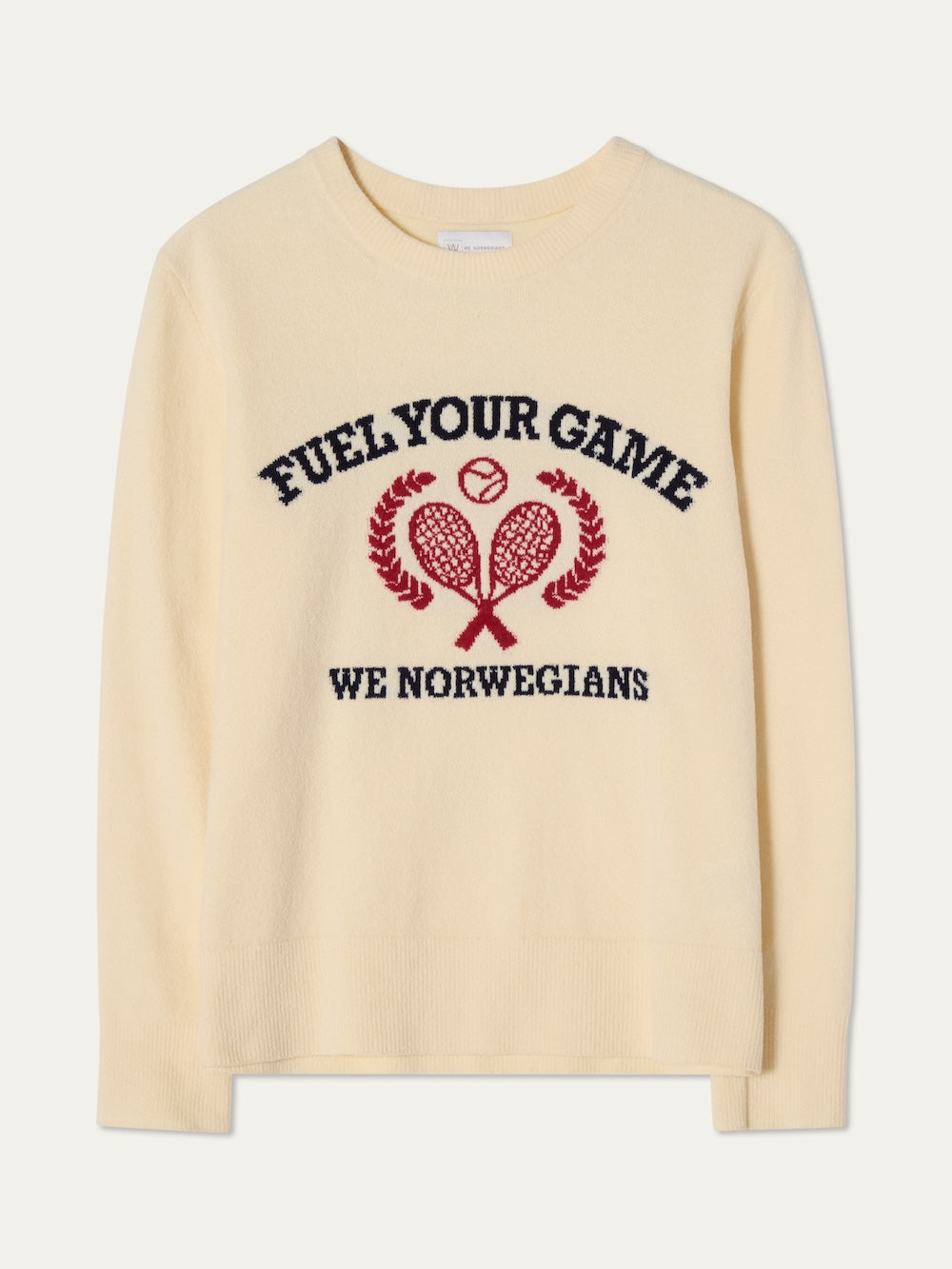 The Deuce Chenille Sweater Women by We Norwegians is a cream cotton chenille sweater made in Italy, with black "FUEL YOUR GAME" and "WE NORWEGIANS" text, plus a red intarsia tennis motif of crossed rackets, ball, and laurel branches at the center.
