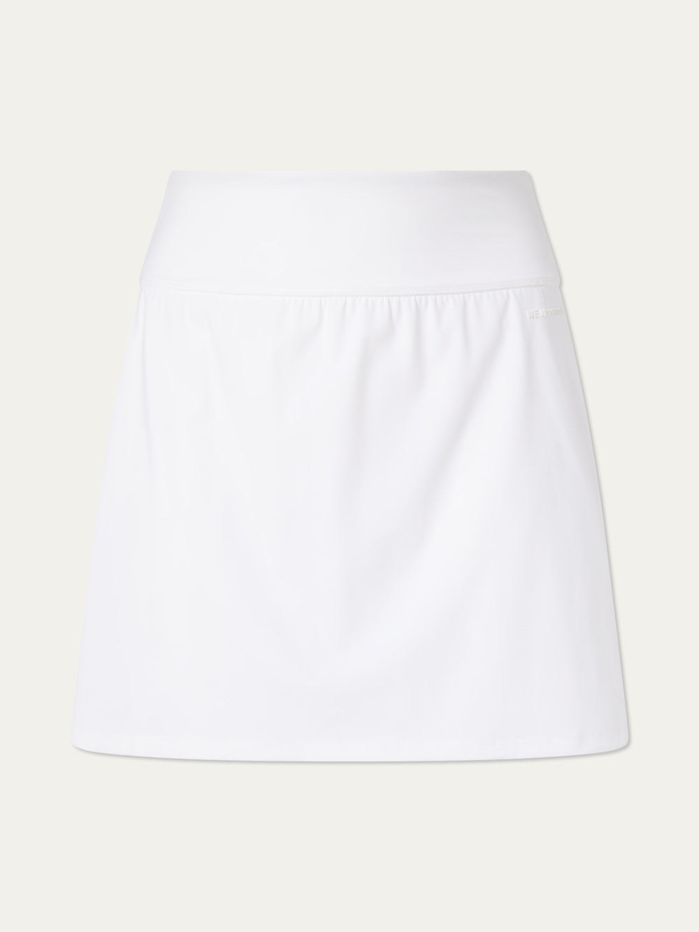 The We Norwegians Honor Skirt Women is a plain white performance tennis skirt with a high waistband, simple design, and built-in shorts, shown against a light background with no visible patterns or embellishments.