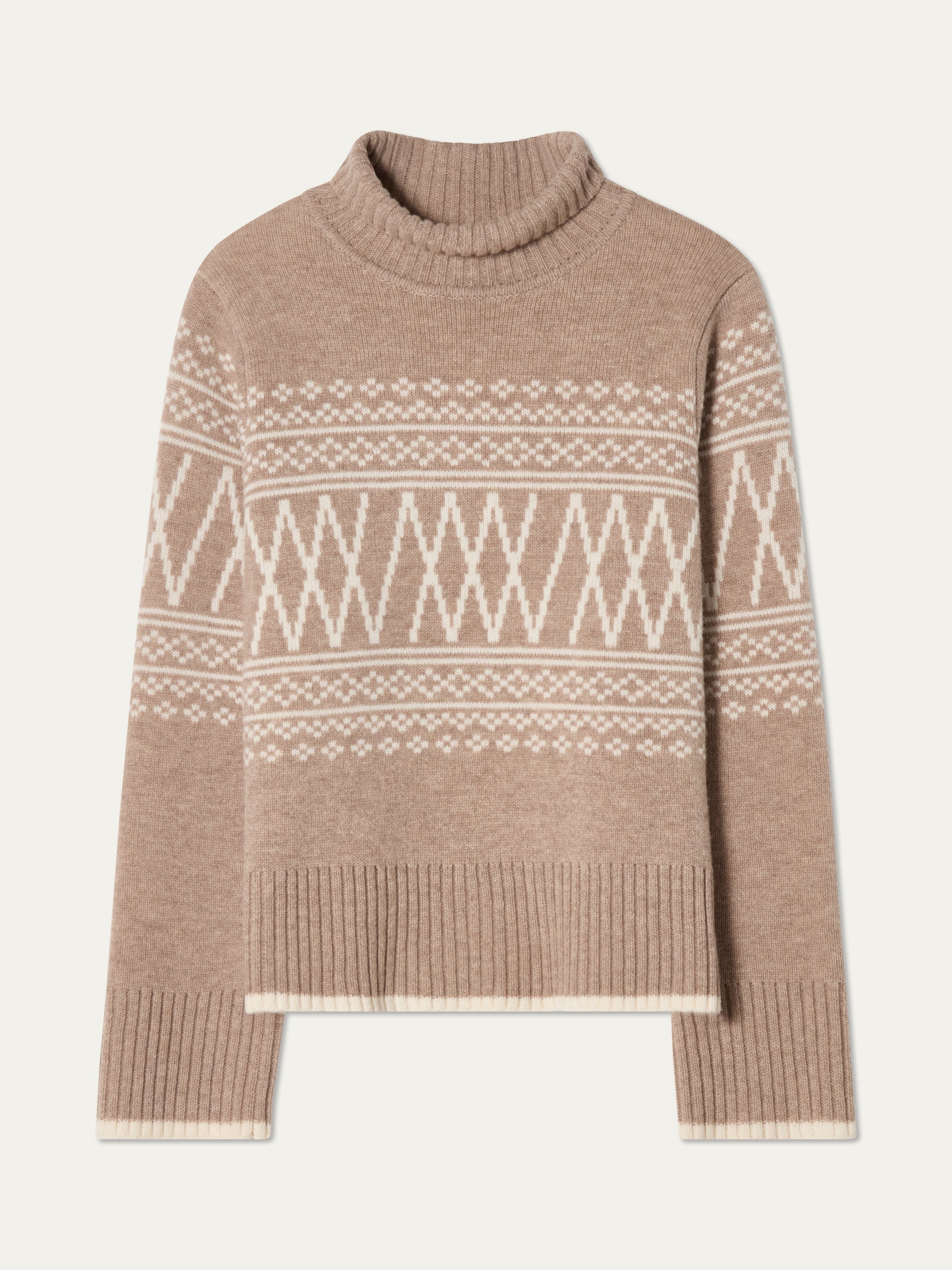 The Setesdal Pullover women by We Norwegians is a beige knit turtleneck sweater with white geometric and diamond patterns across the chest and sleeves, finished with ribbed cuffs and hem.