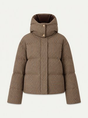 The We Norwegians Glenshee Ski Jacket Women is a brown and beige houndstooth puffer with down filling, high collar, hood, snap buttons, and long sleeves, shown on a plain white background.