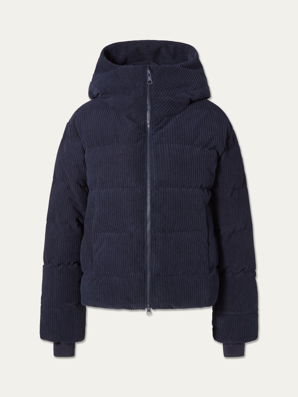The Britt Ski Jacket Women by We Norwegians features a navy blue corduroy texture, full front zipper, long sleeves, and ribbed cuffs—an eco-friendly ski piece shown on a plain white background.