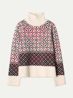The We Norwegians Telemark Sweater Women is a cream turtleneck featuring classic Norwegian-inspired red, black, and cream geometric fair isle patterns across the upper chest, sleeves, and hem, finished with ribbed cuffs and hem for a timeless winter essential.