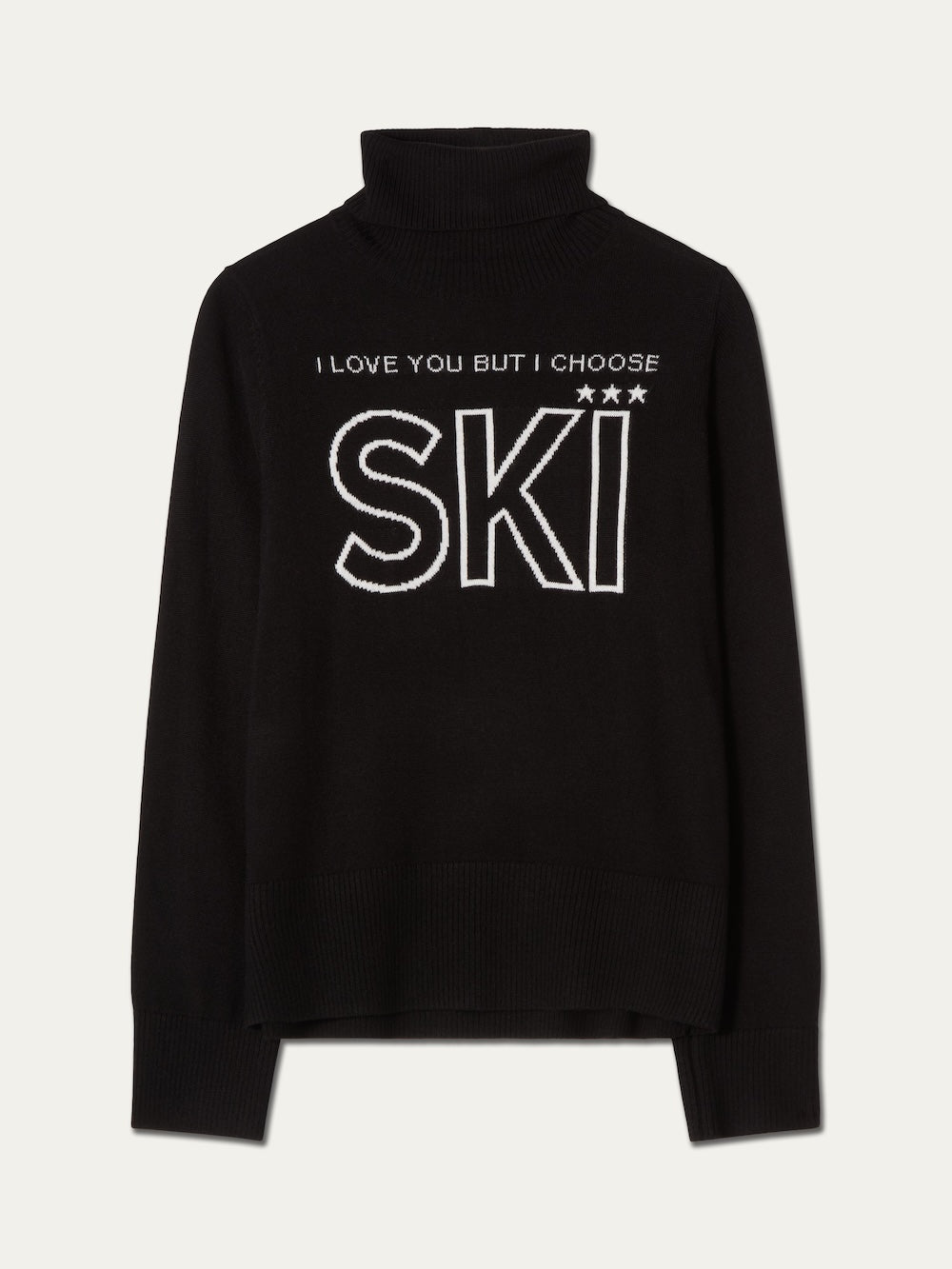 The We Norwegians Bibi Sweater Women features a black turtleneck design with “I LOVE YOU BUT I CHOOSE SKI” emblazoned in bold white letters across the front, blending retro ski fashion with modern style.
