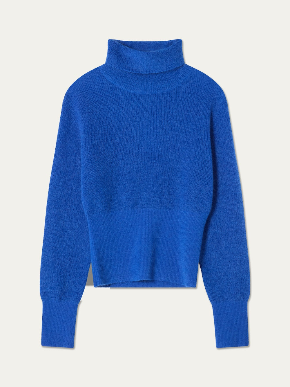 The We Norwegians Pudder Sweater Women is a bright blue, long-sleeve turtleneck crafted from soft mohair yarn, featuring ribbed cuffs and waistband, shown laid flat on a plain white background.