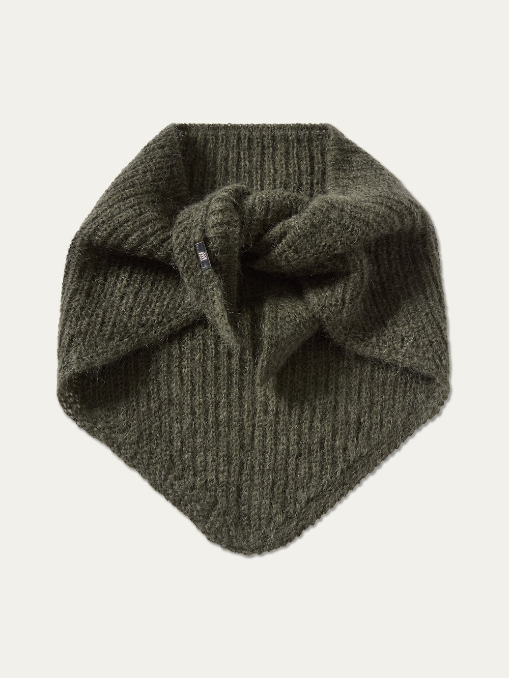 The Pudder Scarf by We Norwegians, shown folded against an off-white background, features a ribbed knit texture in olive green and a subtle black side tag. This designer winter accessory effortlessly combines cozy warmth with sophisticated style—making it the perfect mohair scarf to elevate your seasonal wardrobe.