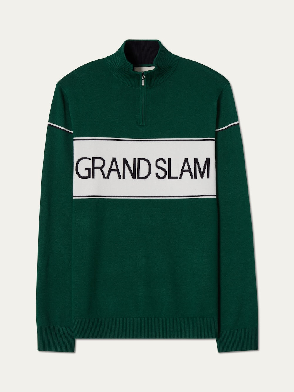 The We Norwegians Grand Slam Sweater Men is a green long-sleeve, half-zip sweater with a white chest stripe and bold "GRAND SLAM" lettering—vintage-inspired and perfect for après sport.
