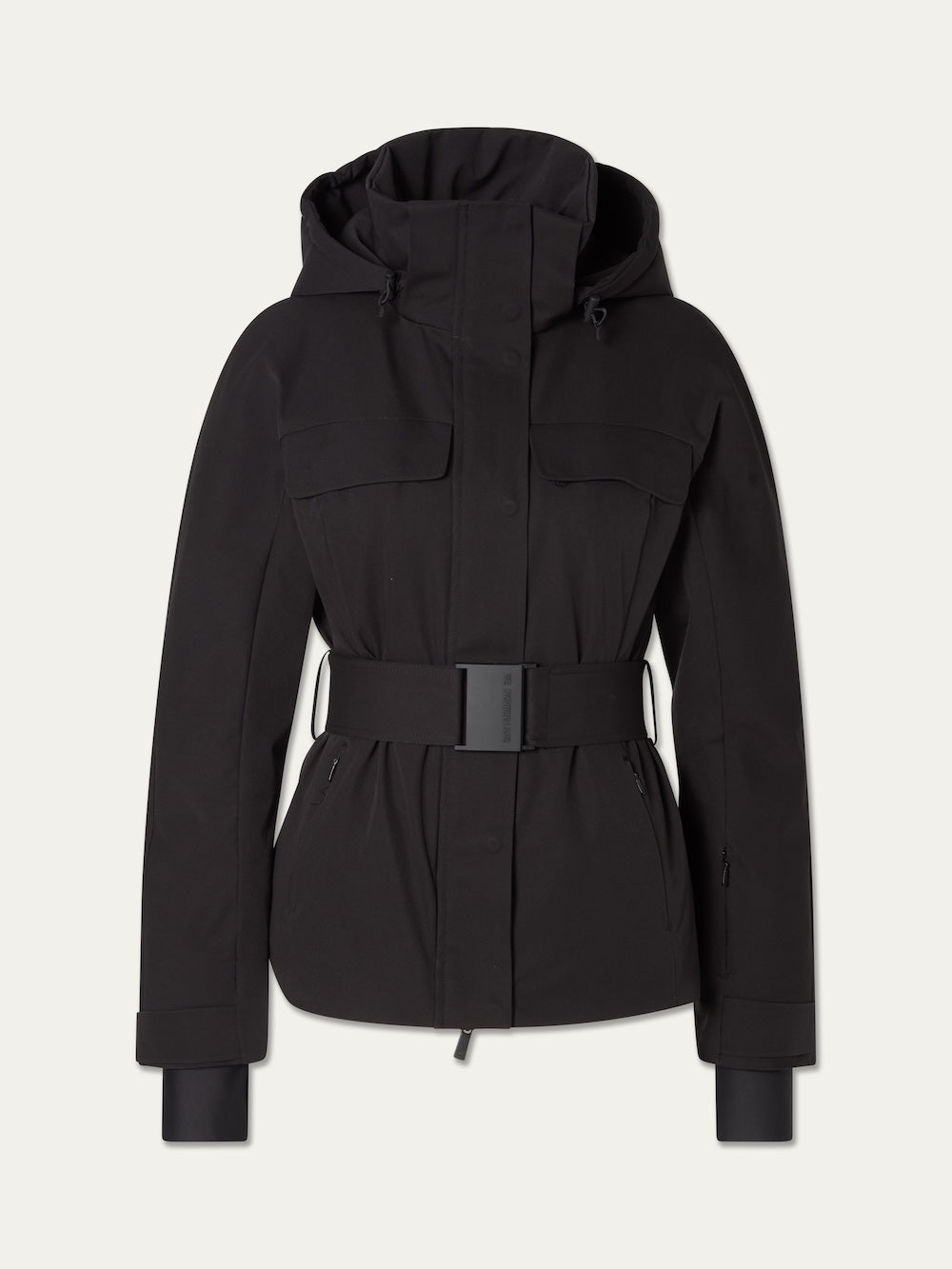 We Norwegians Finse Ski Jacket Women features a hood, front zipper, snap buttons, chest and side pockets, adjustable waist belt, and wide-cuff sleeves—shown on a plain white background.