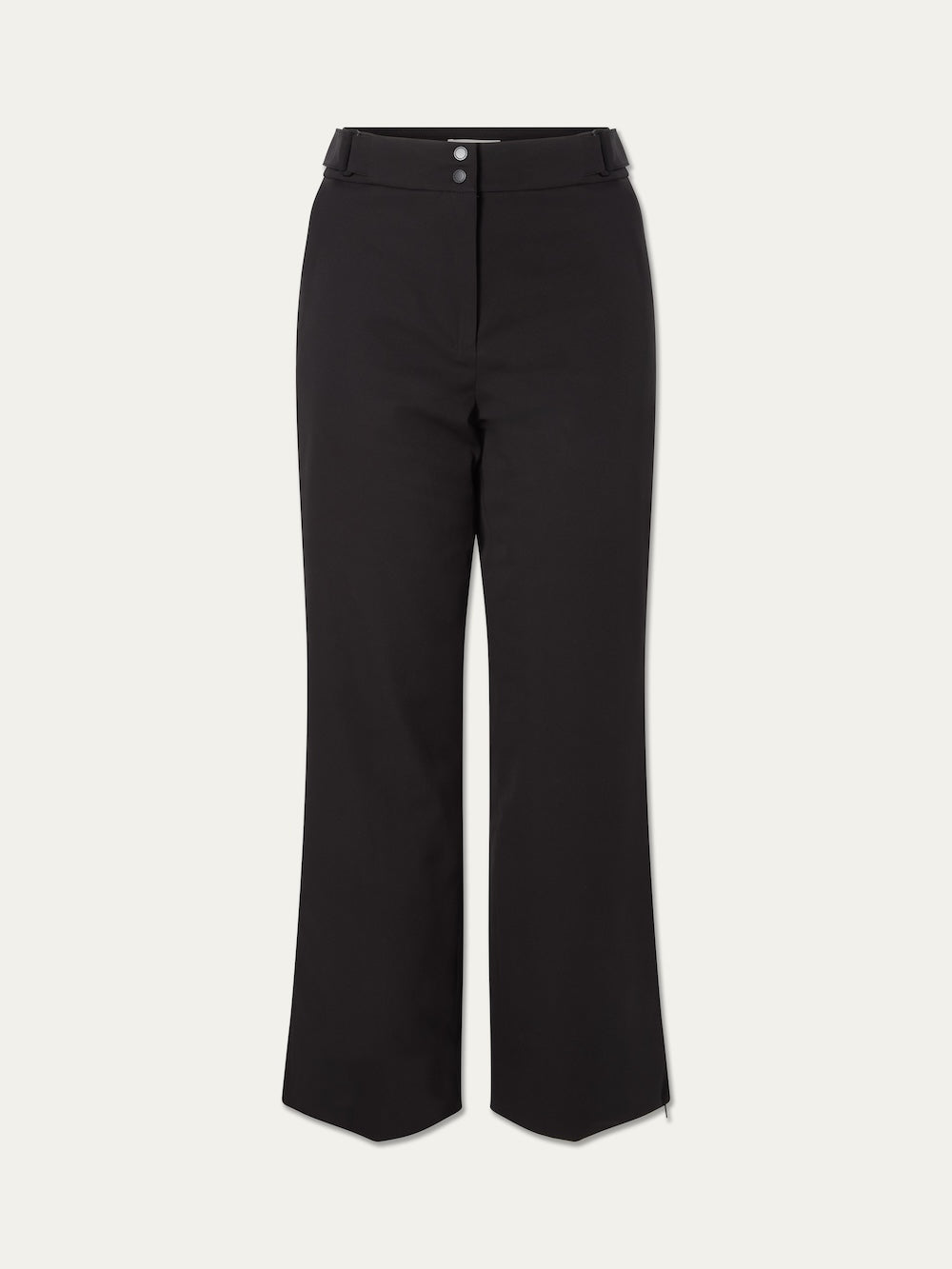 The We Norwegians Finse Ski Pant Women is a black, high-waisted, wide-leg pant with a front zipper, double-button waistband, subtle belt loops, and alpine-inspired design shown on a plain white background.