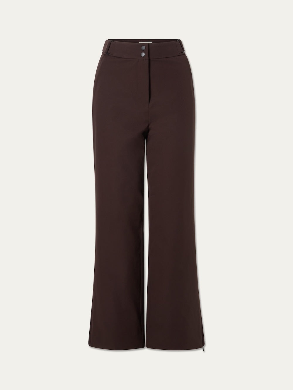 The We Norwegians Finse Ski Pant Women are high-waisted, wide-leg brown trousers with a front zipper and two-button closure, inspired by alpine functionality and classic ski style. Displayed on a plain light background.