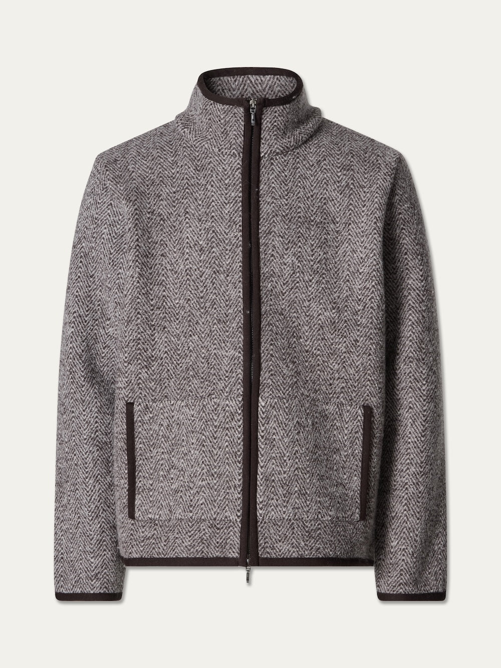 The Laerdal Boiled Wool Jacket Men by We Norwegians is a gray and brown herringbone-pattern zip-up jacket, featuring a stand collar and dark trim on the zipper, pockets, and cuffs—expertly crafted in the tradition of Scandinavian craftsmanship—and displayed against a plain background.