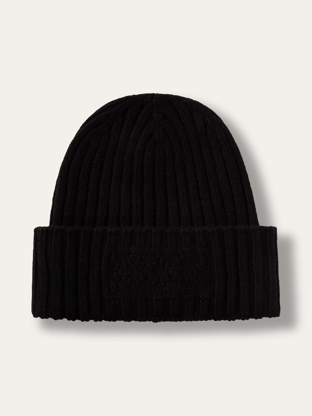 Black ribbed knit We Norwegians Geilo Hat with a folded cuff.