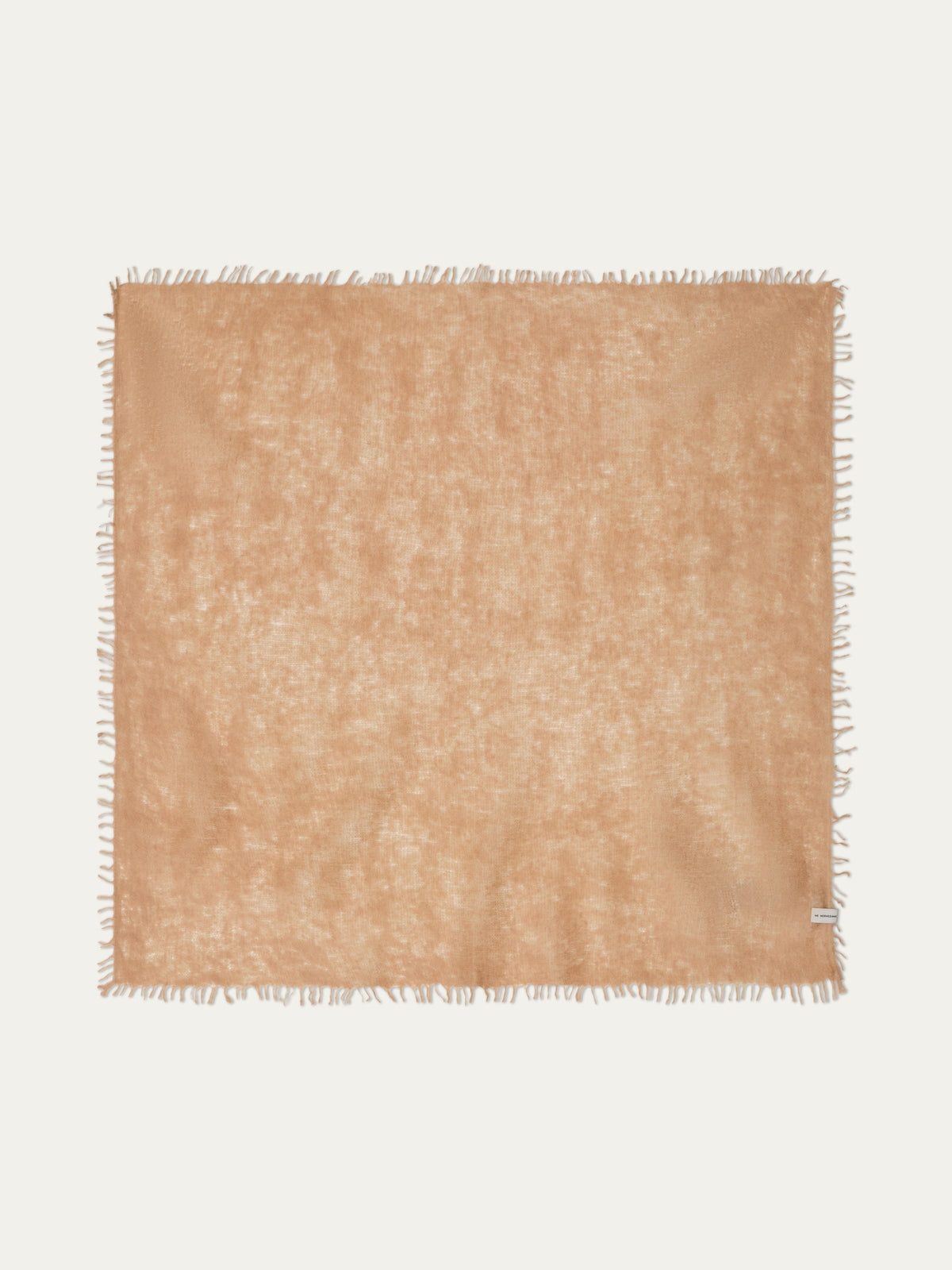 A featherlight, square tan We Norwegians Monogram Cashmere Scarf with a fringed border.