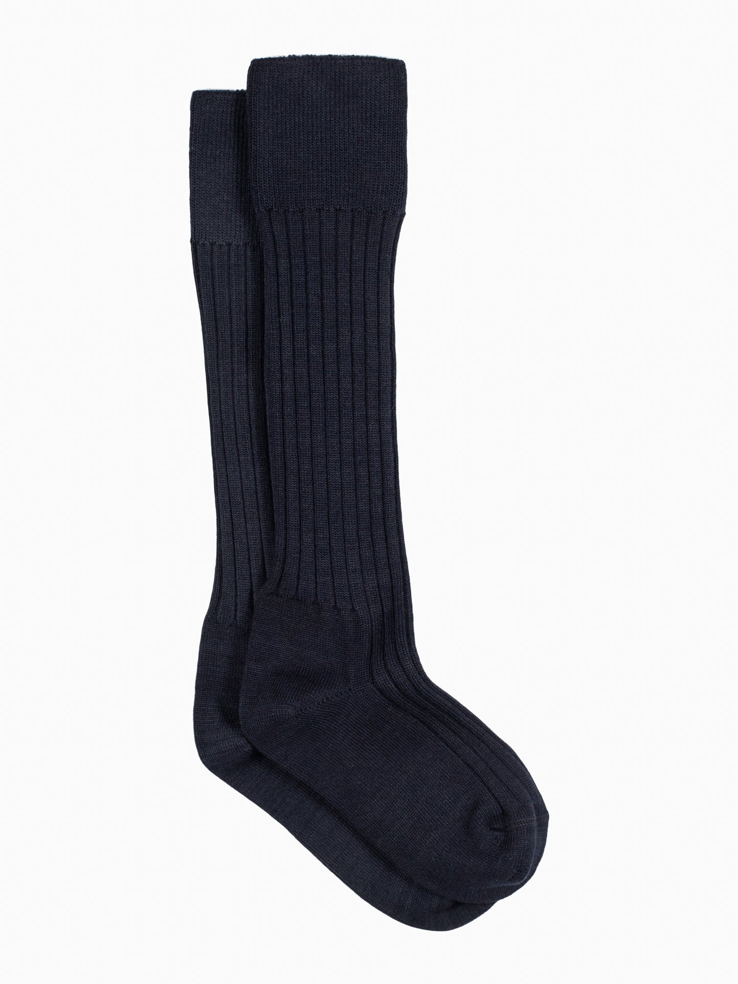 A pair of We Norwegians Telemark Socks, crafted from a wool blend, rests against a plain white background. These long, black ribbed unisex socks are neatly folded with one slightly overlapping the other, offering style and versatility.