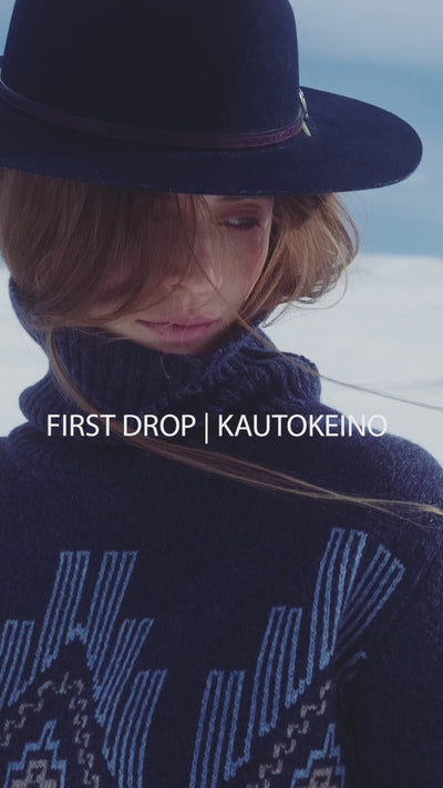 We Norwegians_FW25_Women | A video of snowy Geilo showcasing a modeal wearing Kautokeino sweater in Navy blue