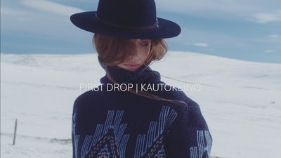 We Norwegians_FW25_Women | A video of snowy Geilo showcasing a modeal wearing Kautokeino sweater in Navy blue